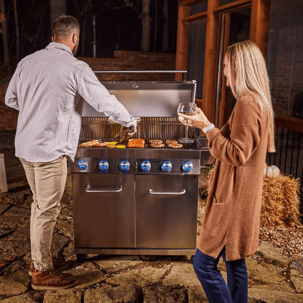 Monument Grills 6+1 Burner Propane Gas Grill  84,000 BTU Stainless Steel Outdoor Patio Barbecue Grill  LED Controls , Free Rotisserie Kit , and Easy Cleanup , 77352 Monument Grills