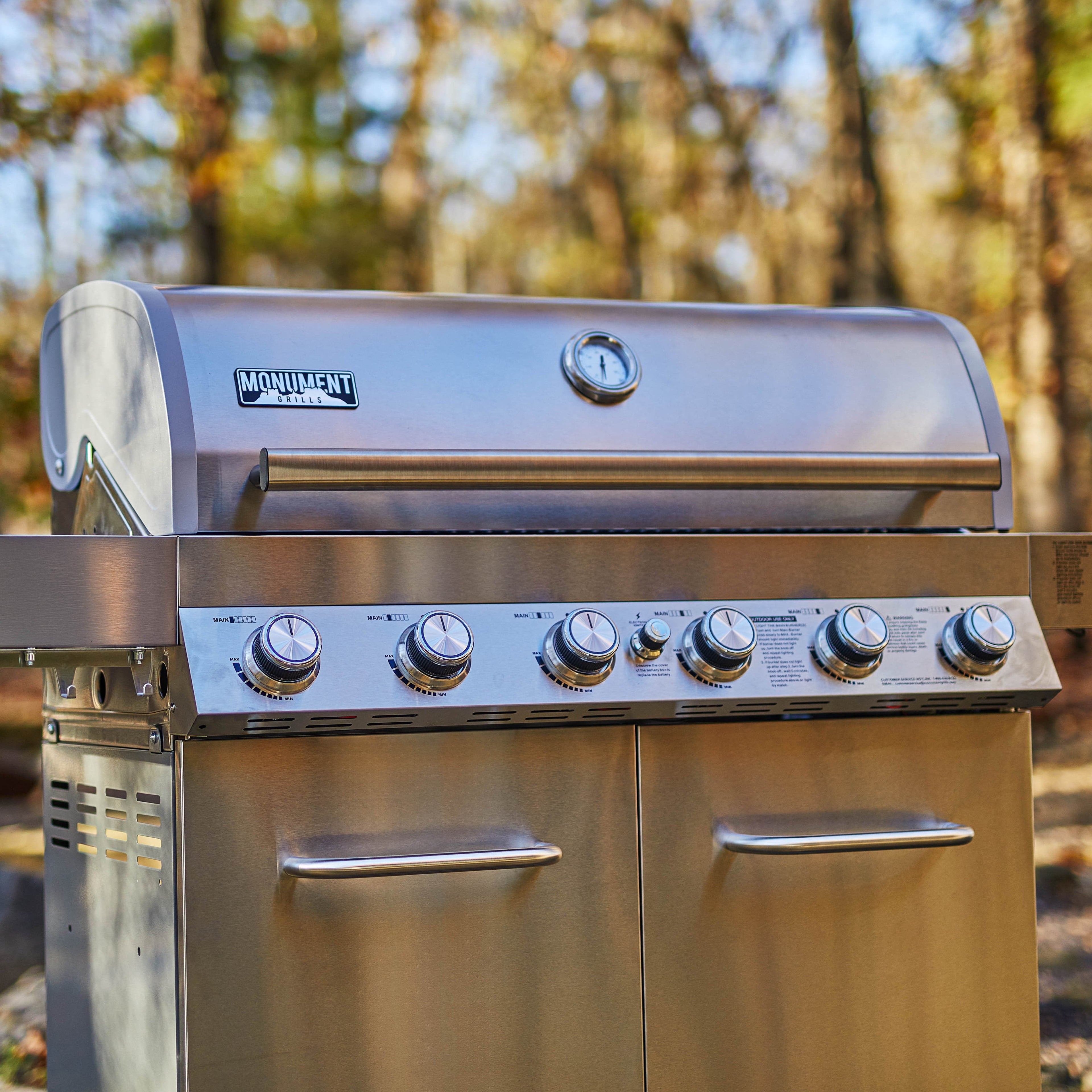 Monument Grills 6+1 Burner Propane Gas Grill  84,000 BTU Stainless Steel Outdoor Patio Barbecue Grill  LED Controls , Free Rotisserie Kit , and Easy Cleanup , 77352 Monument Grills