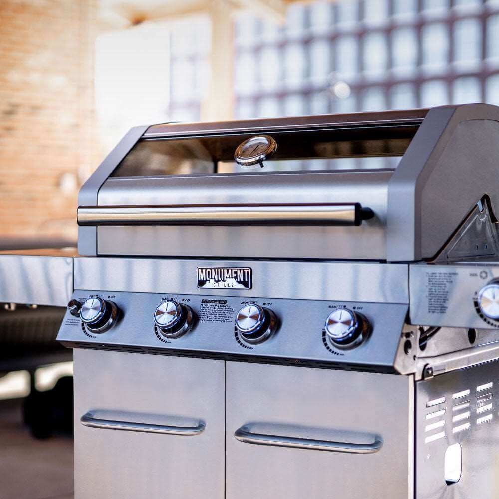 Monument Grills 4-Burner Natural Gas Grill in Stainless with Clear View Lid, LED Controls, Grill Cover, and Side Burner Monument Grills